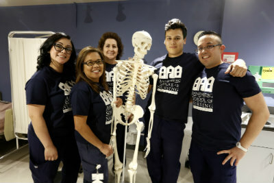 Nurses with dummy skeleton