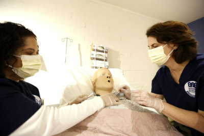 Nurse with dummy patient