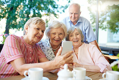 Elderly looking at their phone screen