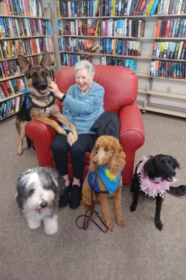Woman with Four Dogs Narrow