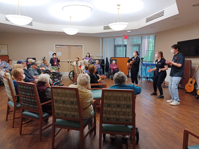 Taft high School music club entertains residents.