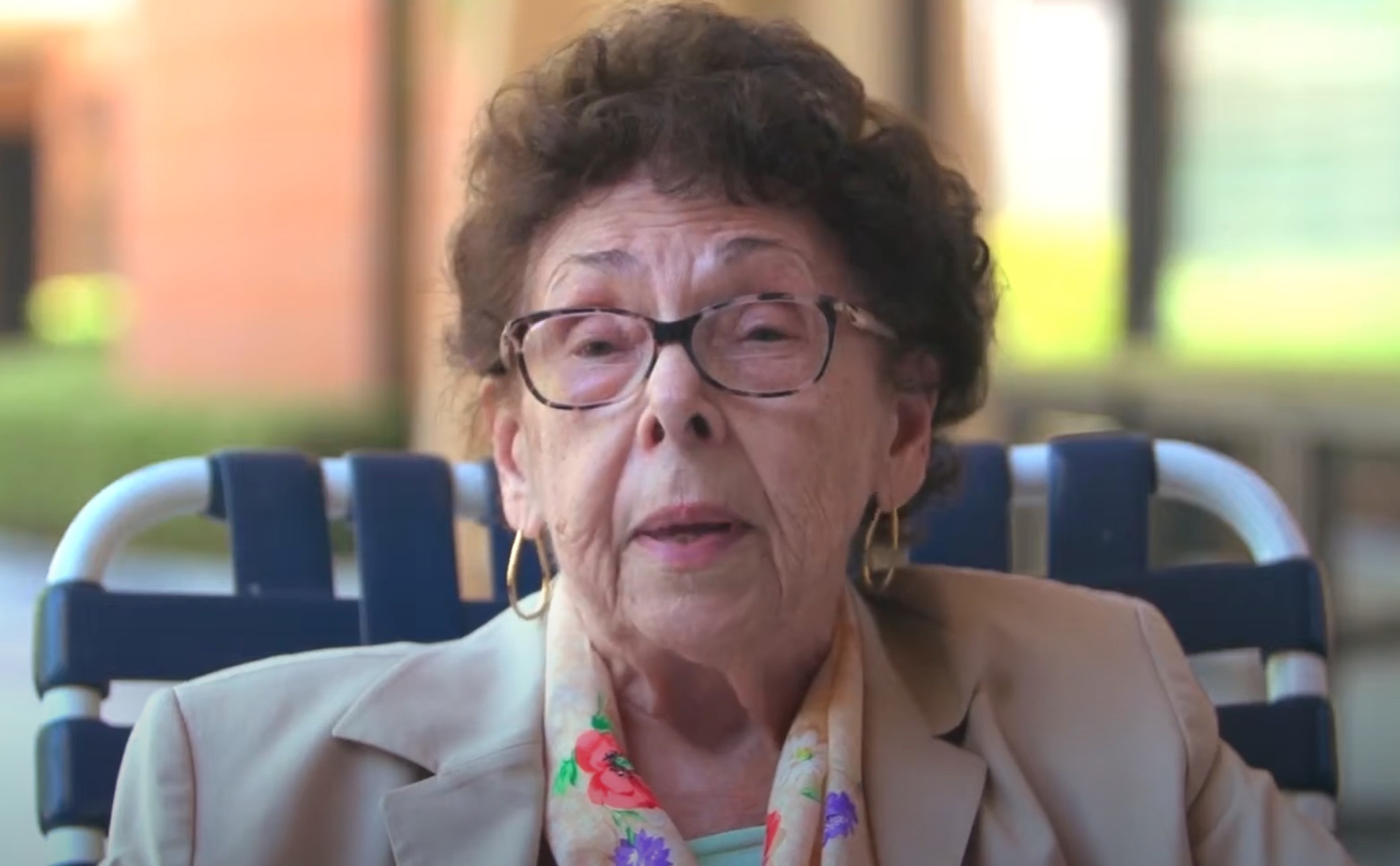 Older woman sitting in chair