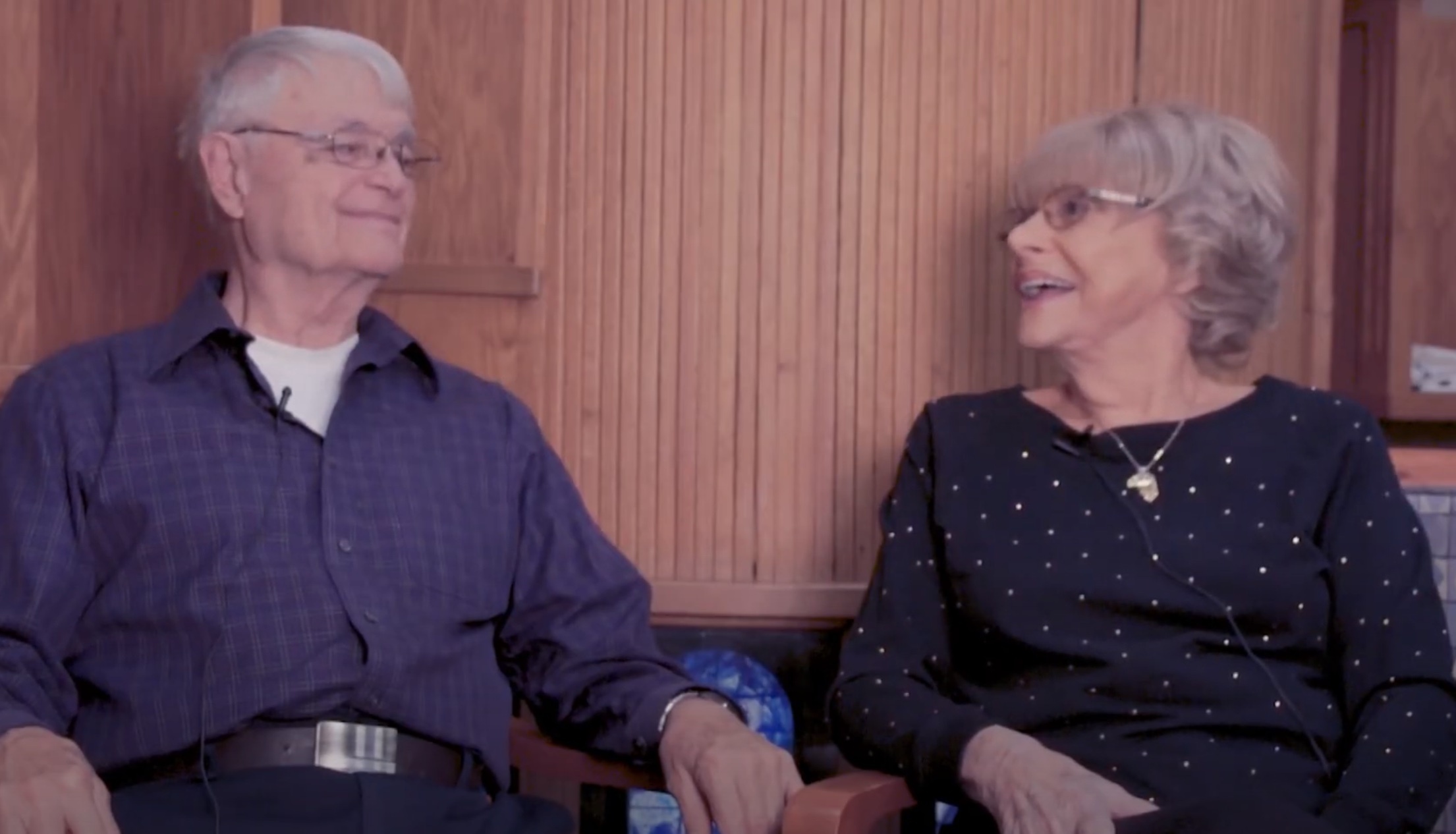 Older couple looking at one another while smiling